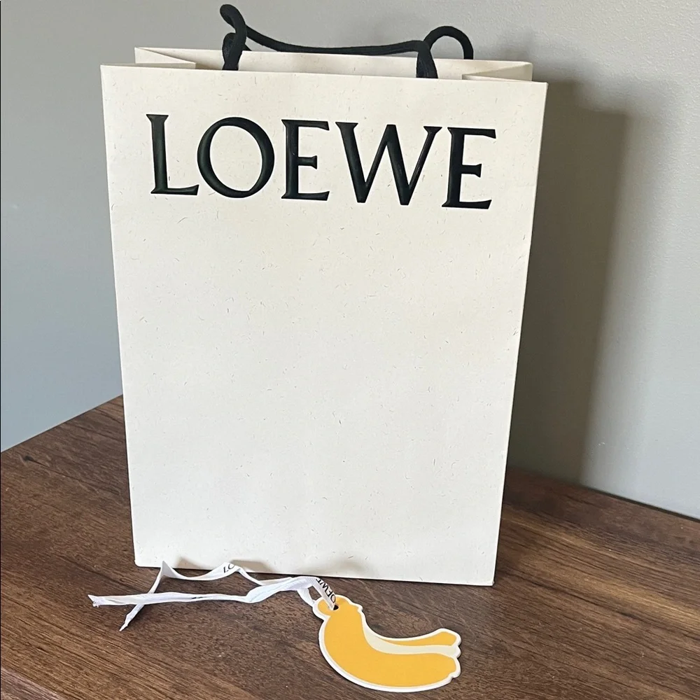 Loewe Cream Paper Gift Bag with Black Logo and Yellow Tag
